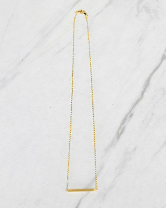 Styled view of Brushed Gold Bar Necklace