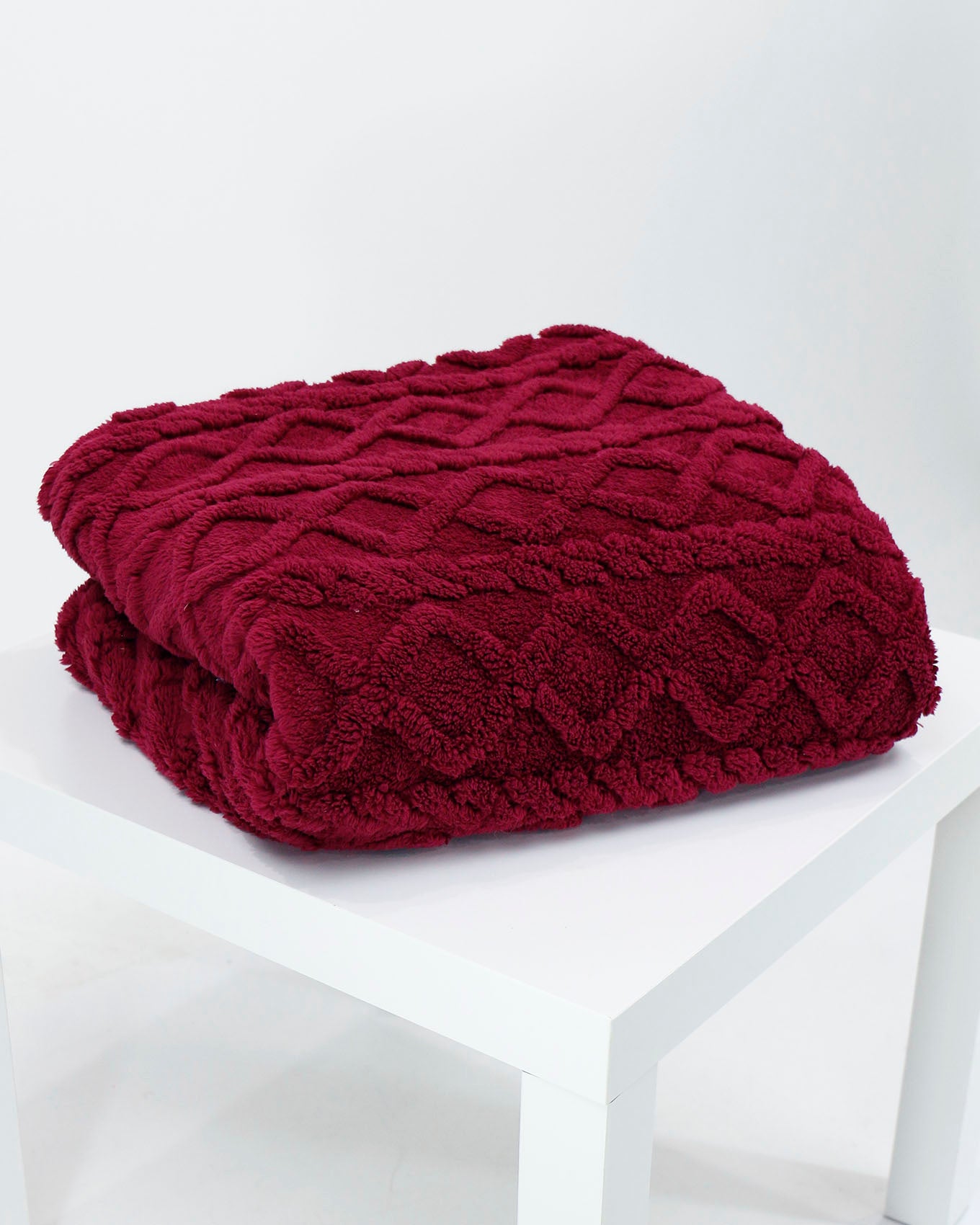 Stock shot of Winterberry Cabled Sherpa Blanket