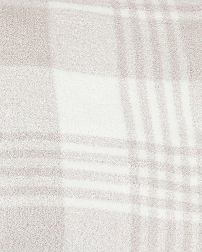 detail view of neutral plaid blanket