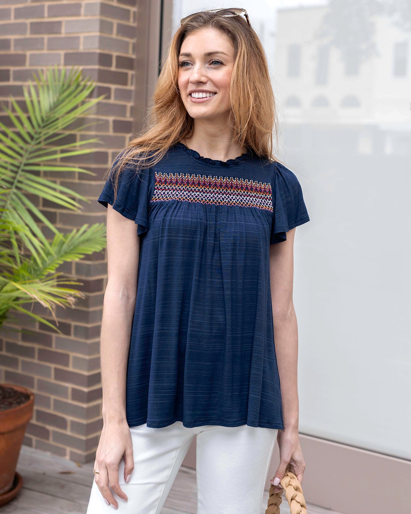 Styled view of Navy/Multi Ellis Knit Embroidered Top