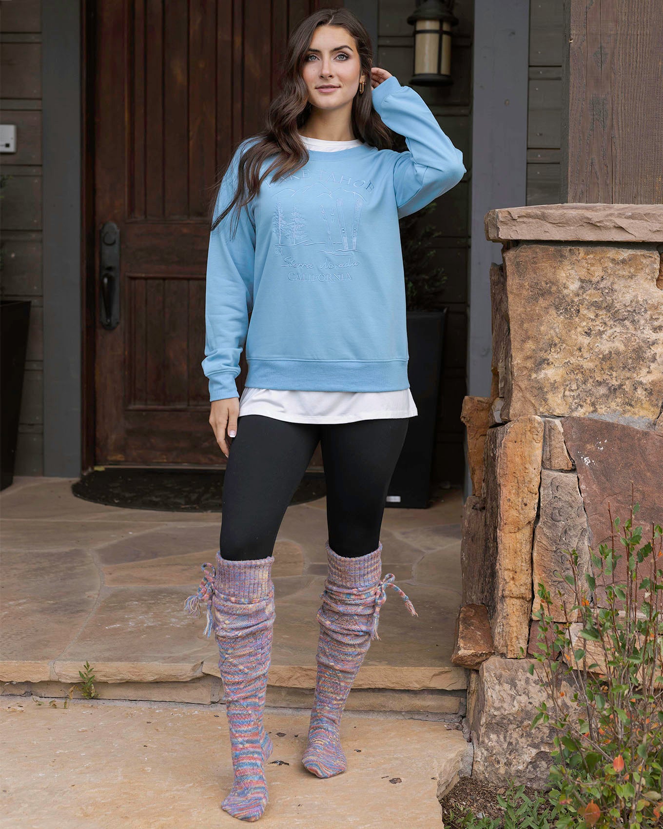 full body view of embroidered sweatshirt