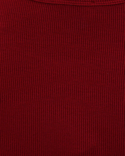 Close up view of fabric on ruby ribbed tee