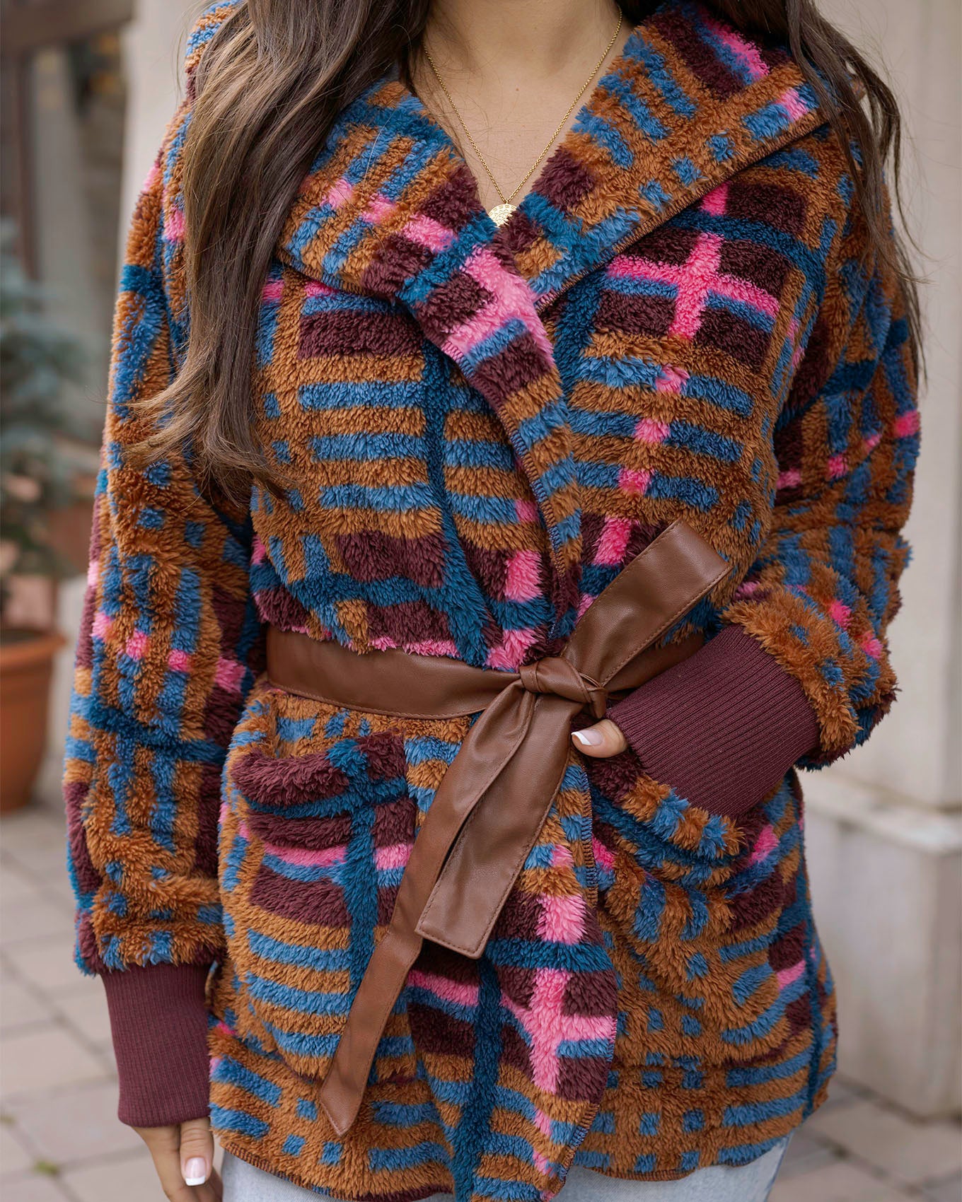 detail view of fleece jewel plaid wrap jacket