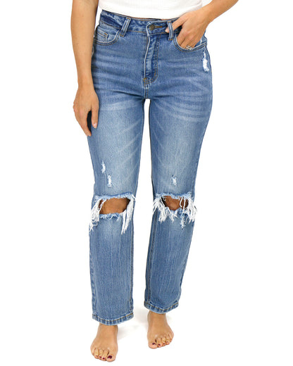 Front uncuffed stock shot of Mid-Wash Distressed High Rise Girlfriend Jeans