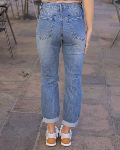 Back view of Mid-Wash Non Distressed High Rise Girlfriend Jeans