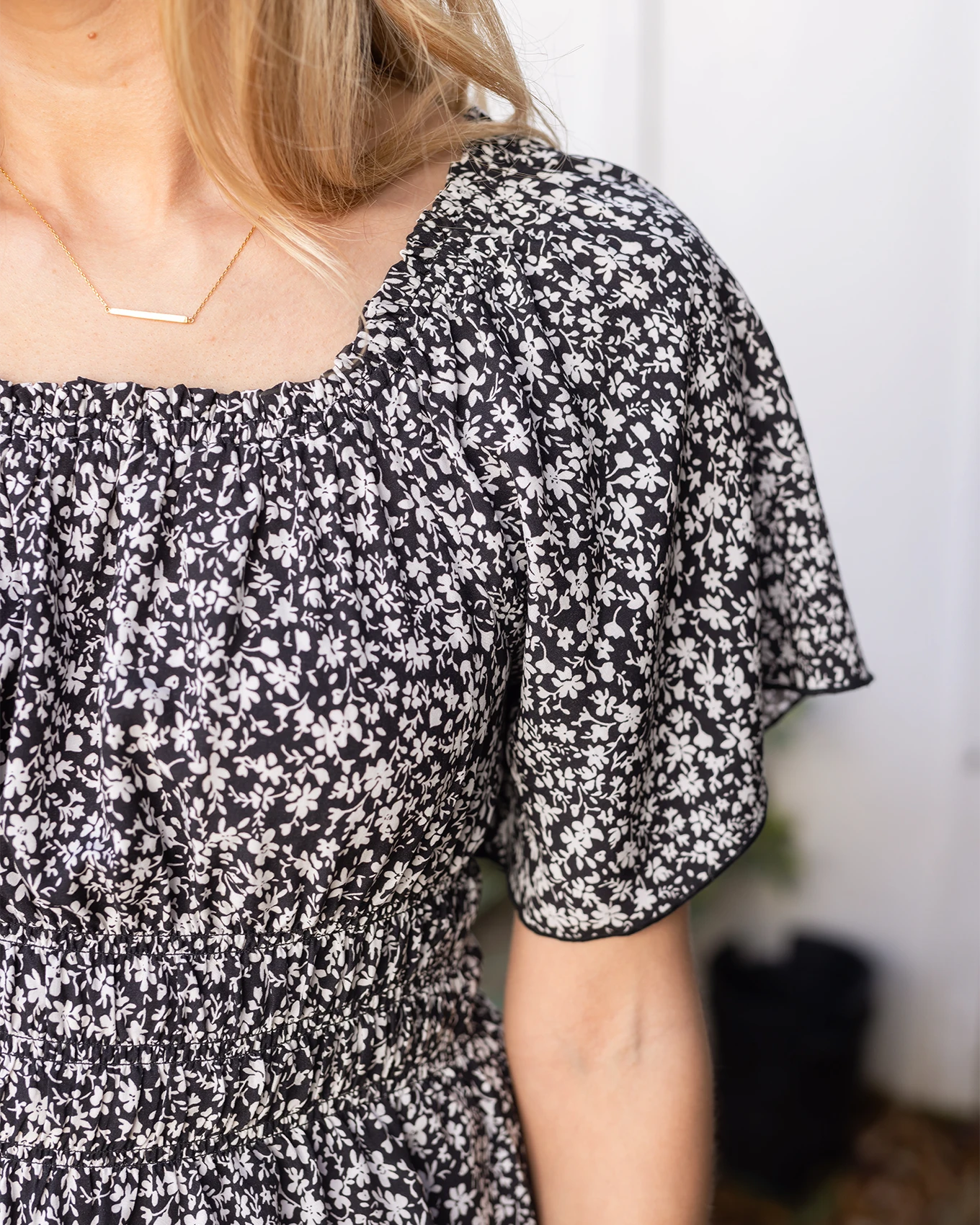 Detail black smocked top