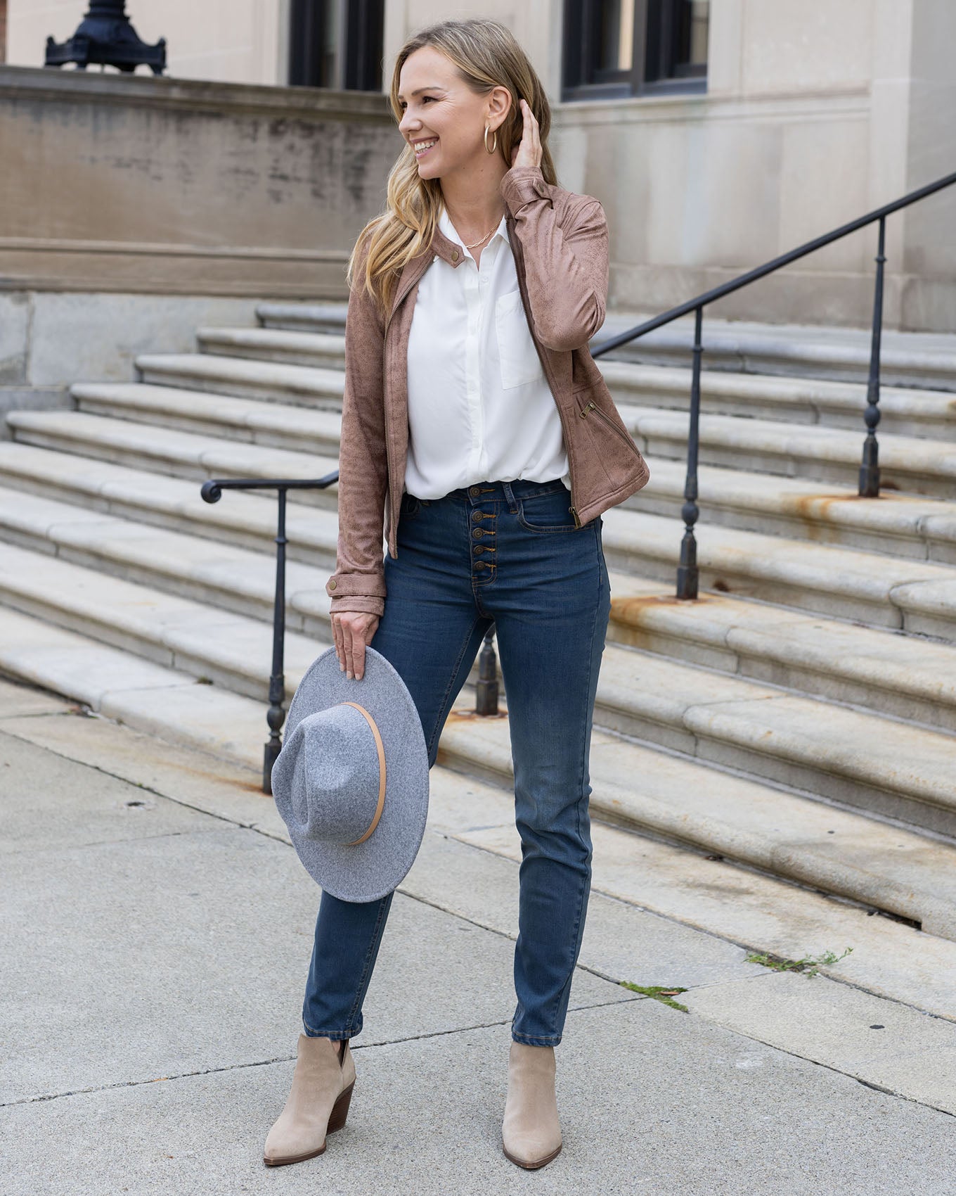 styled view of taupe leather like cafe racer jacket