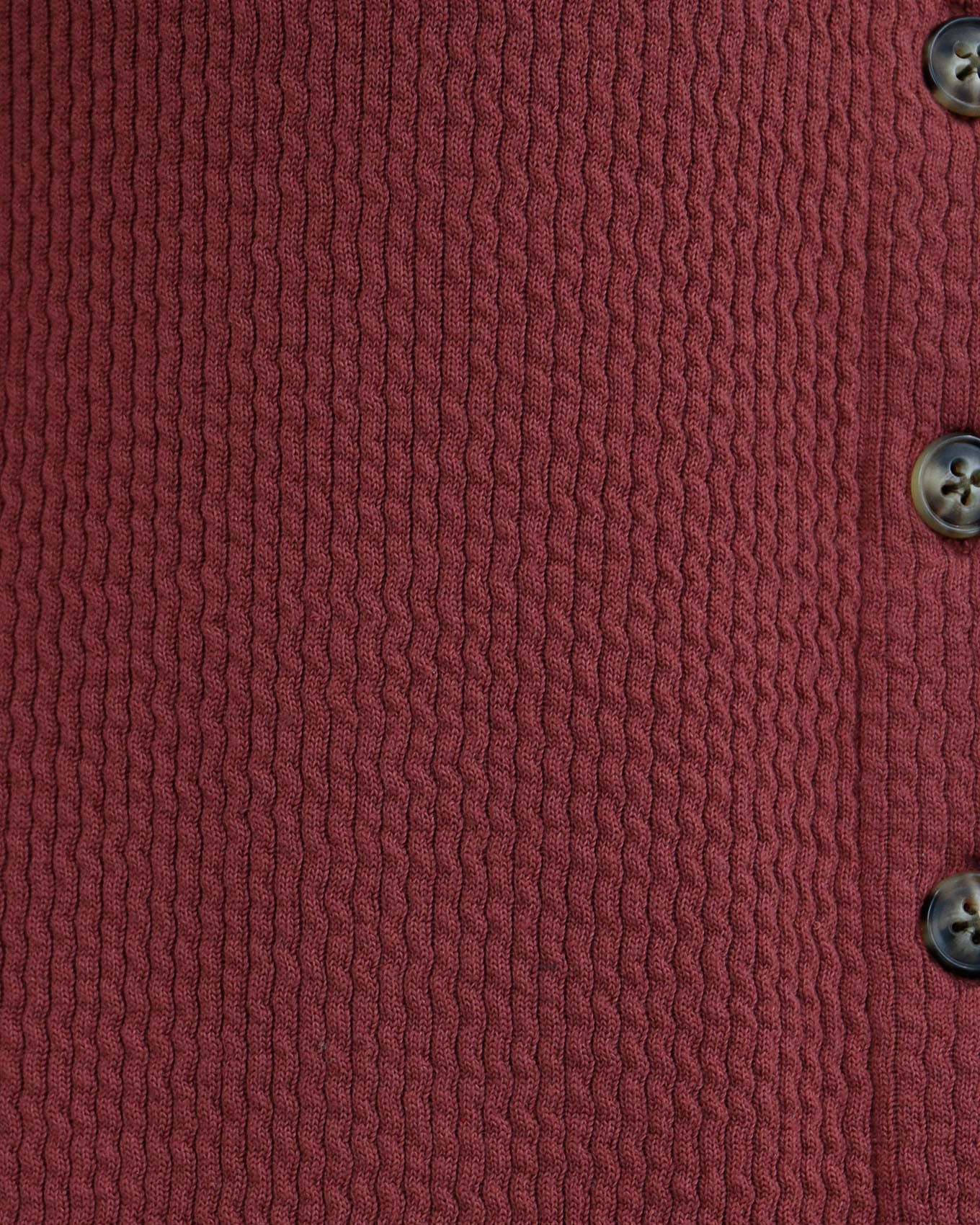 detail view of red ribbed shacket