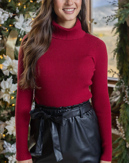front view of red ribbed turtle neck 
