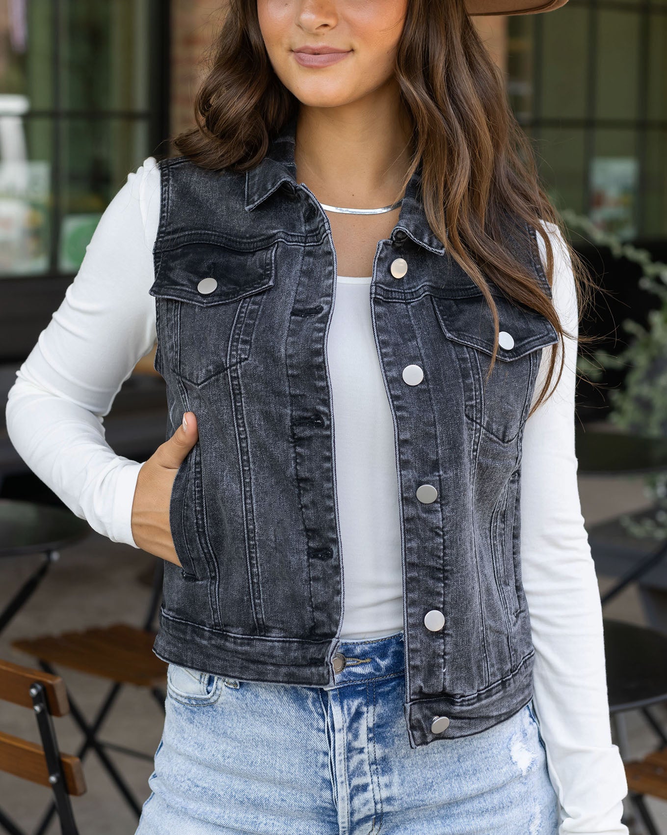 Front view of Washed Black Repurposed Denim Vest