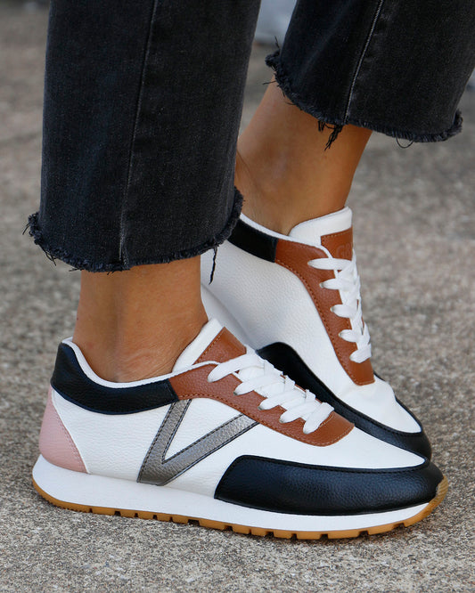 side view of black/white street sneakers side view of black/white street sneakers