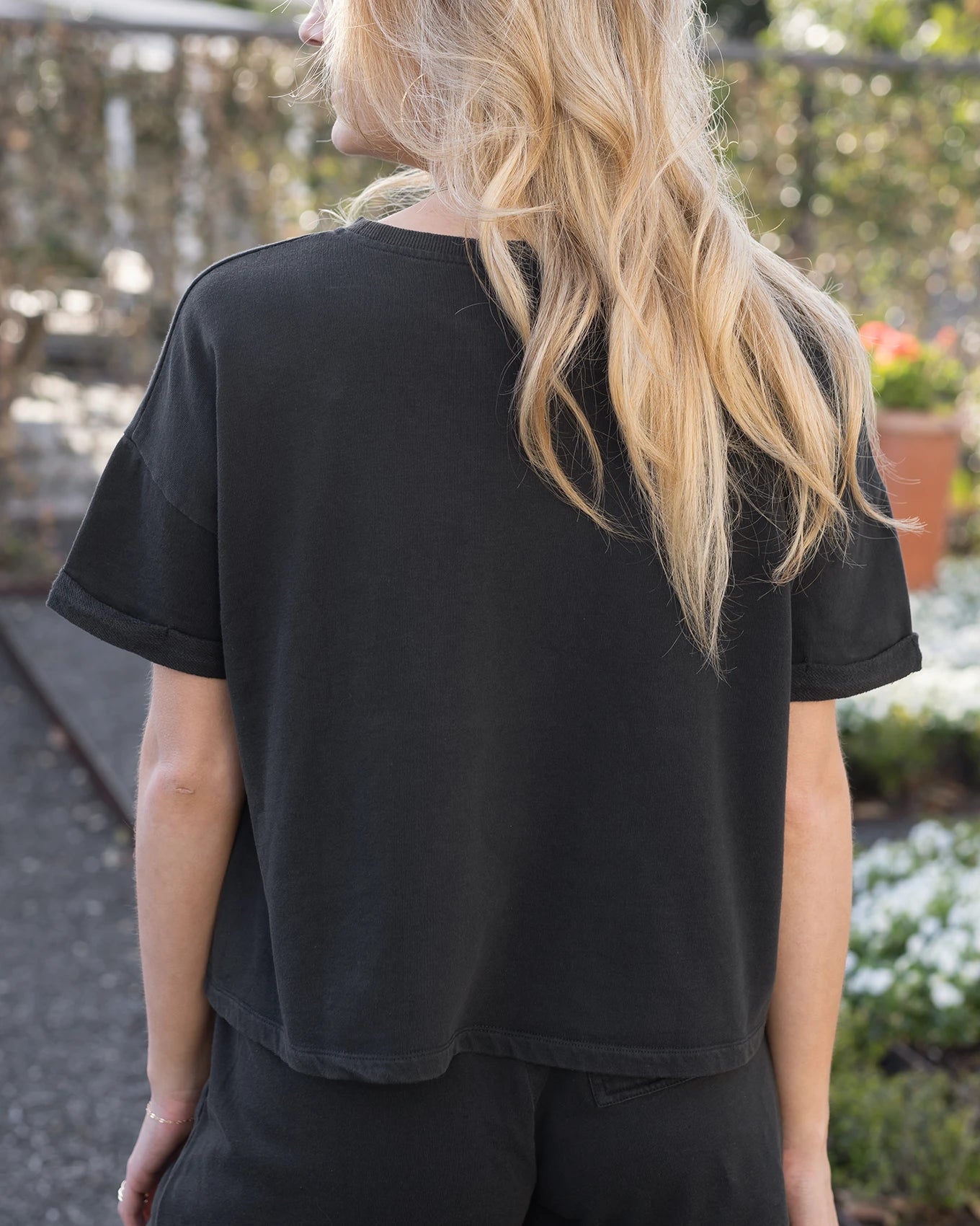 Back view crew neck pullover in black