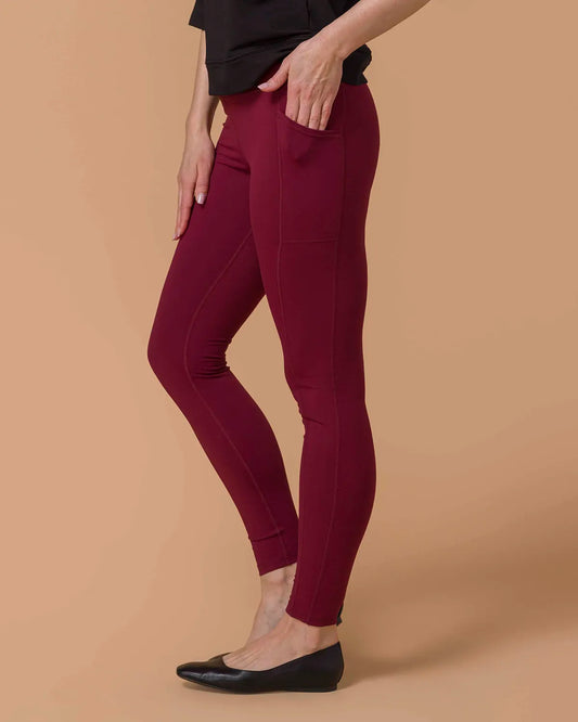 Best Squat Proof Leggings with Pocket in Cranberry Woman wearing Best Squat Proof Leggings with Pocket in Cranberry and Black top turned to the side