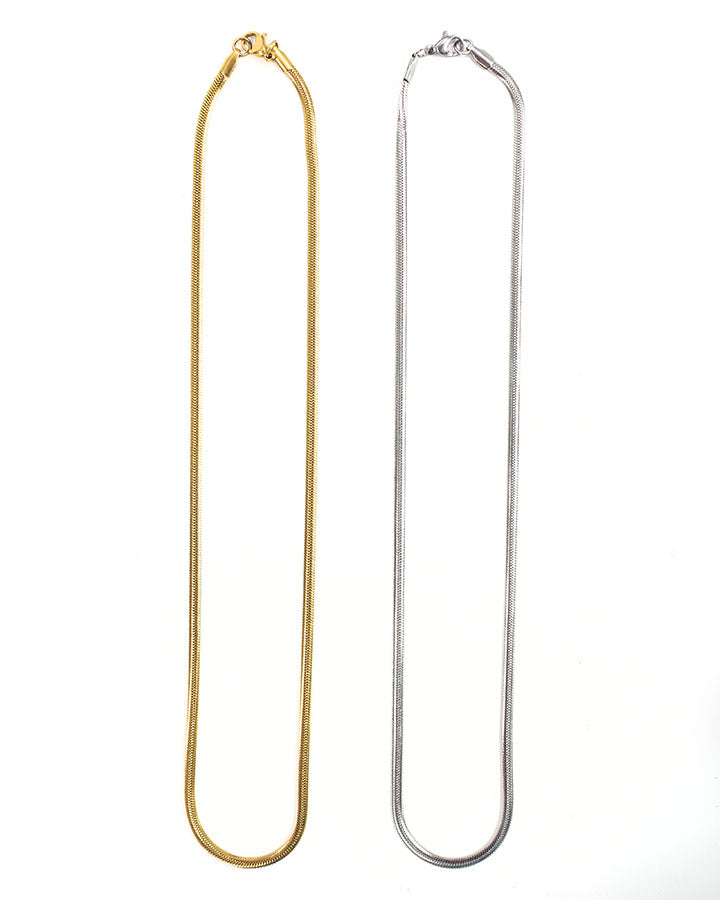 front view of gold and silver flat chain necklace