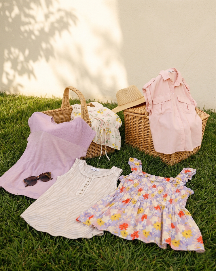 Spring tops in the lawn with basket and sun glasses