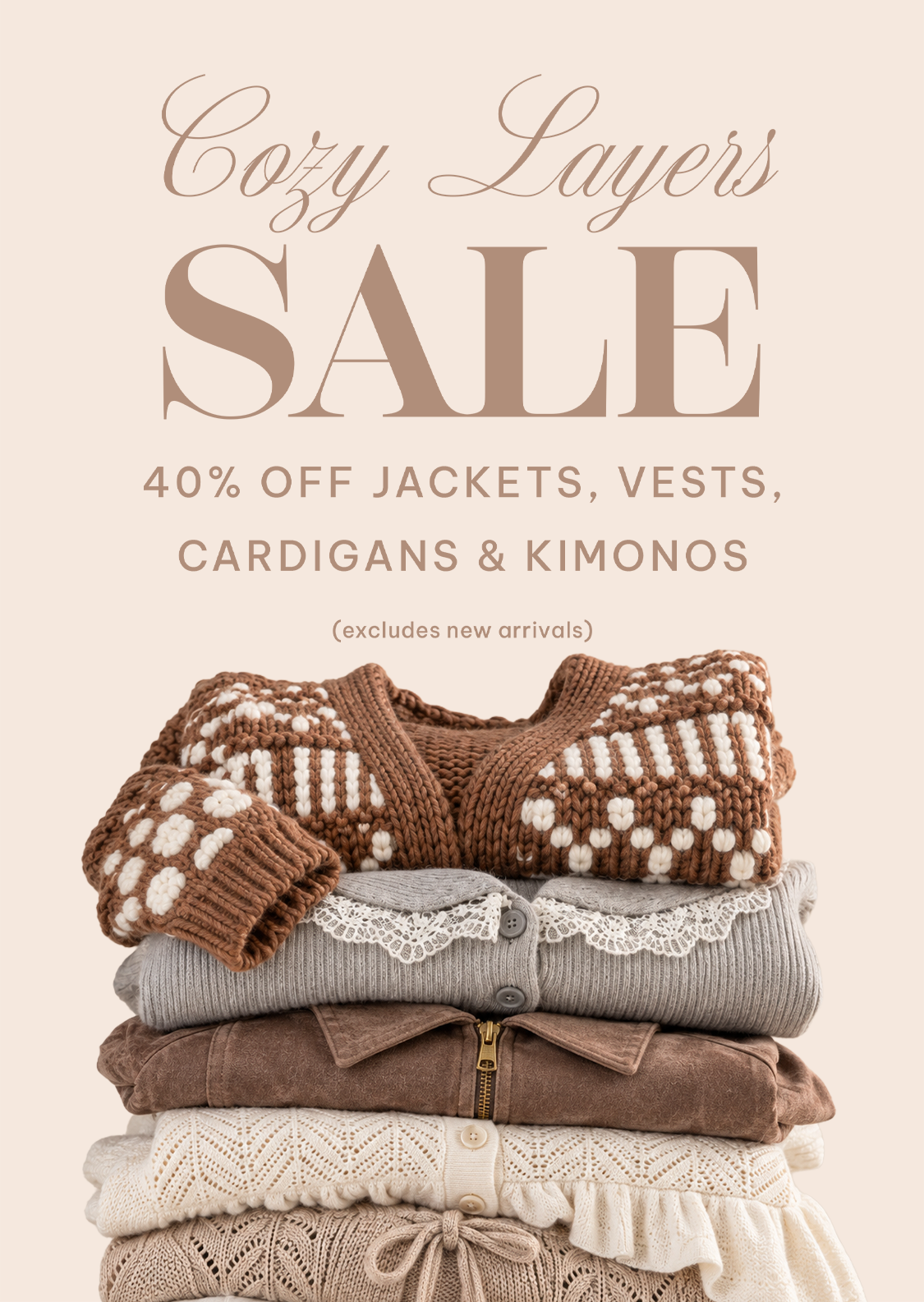 Promotional graphic for Cozy Layers Sale featuring a stack of folded knit and knitwear items in brown, gray, cream, and taupe tones, with large sale text above on a warm beige background.