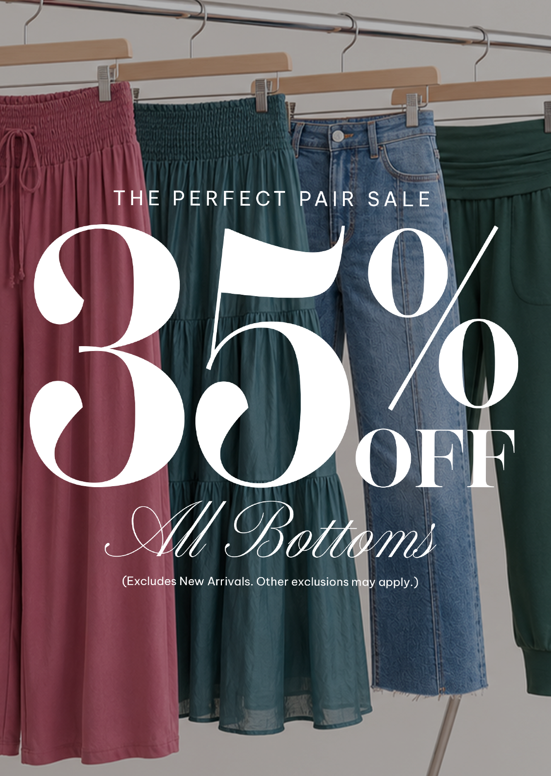 Promotional banner showing several women's bottoms on hangers, including a dusty rose skirt, a teal smocked skirt, a blue denim skirt, and a dark green skirt, with large white text reading '35% OFF All Bottoms' and 'THE PERFECT PAIR SALE'.