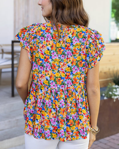 back view of freesia floral ruffle sleeve women's blouse