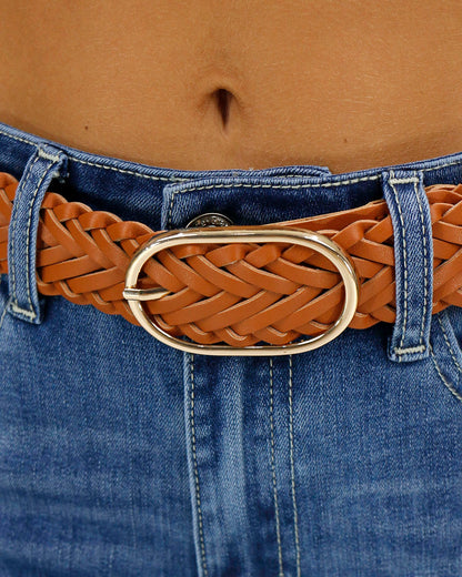 Close up stock image of women's braided faux leather gold buckle belt