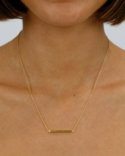 Styled view of Brushed Gold Bar Necklace