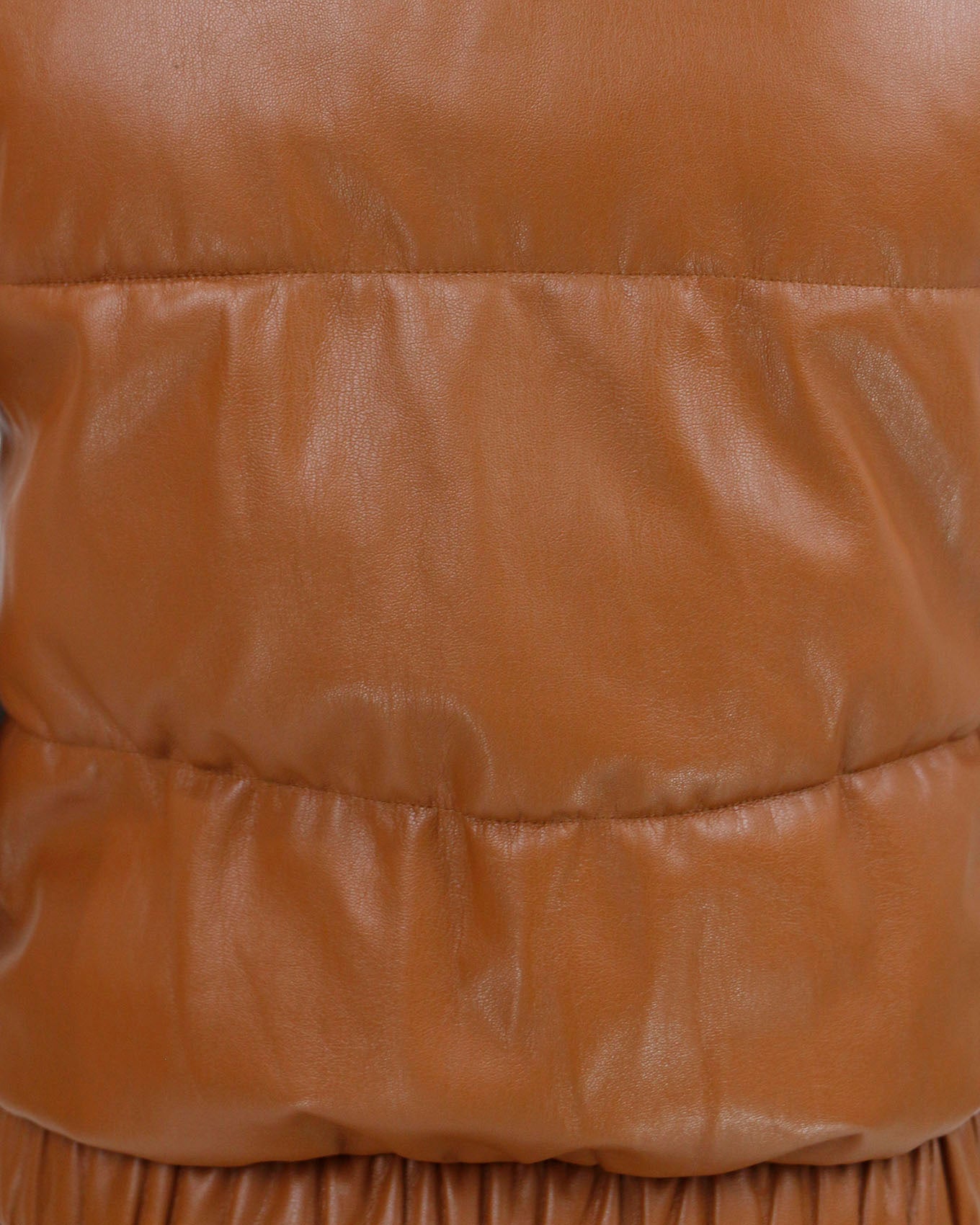 detail view of cognac faux leather puffer vest