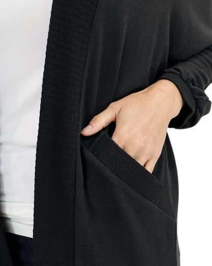 close up view of buttery soft black cocoon cardi
