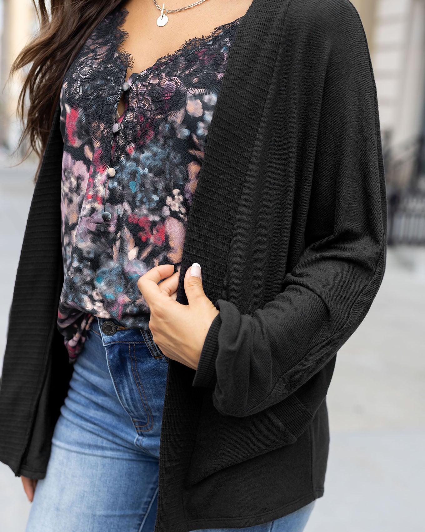 close up view of buttery soft black cocoon cardi