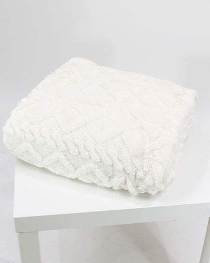 Stock shot of Winter White Cabled Sherpa Blanket