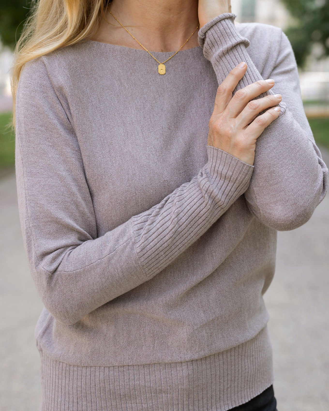 Close up view of Almondine Classic and Cozy Sweater Top