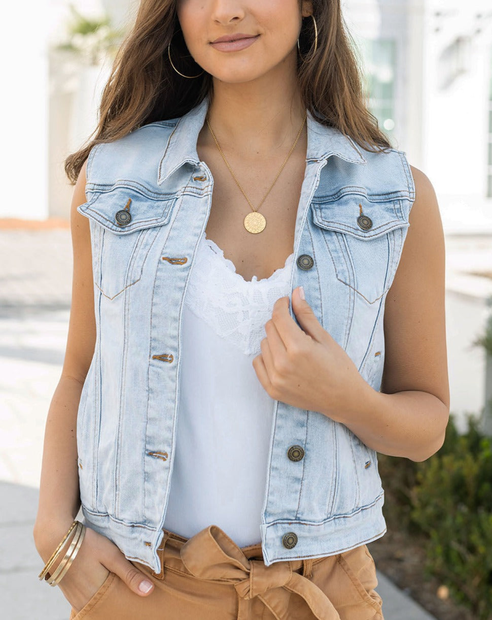 Front view of light-wash denim vest