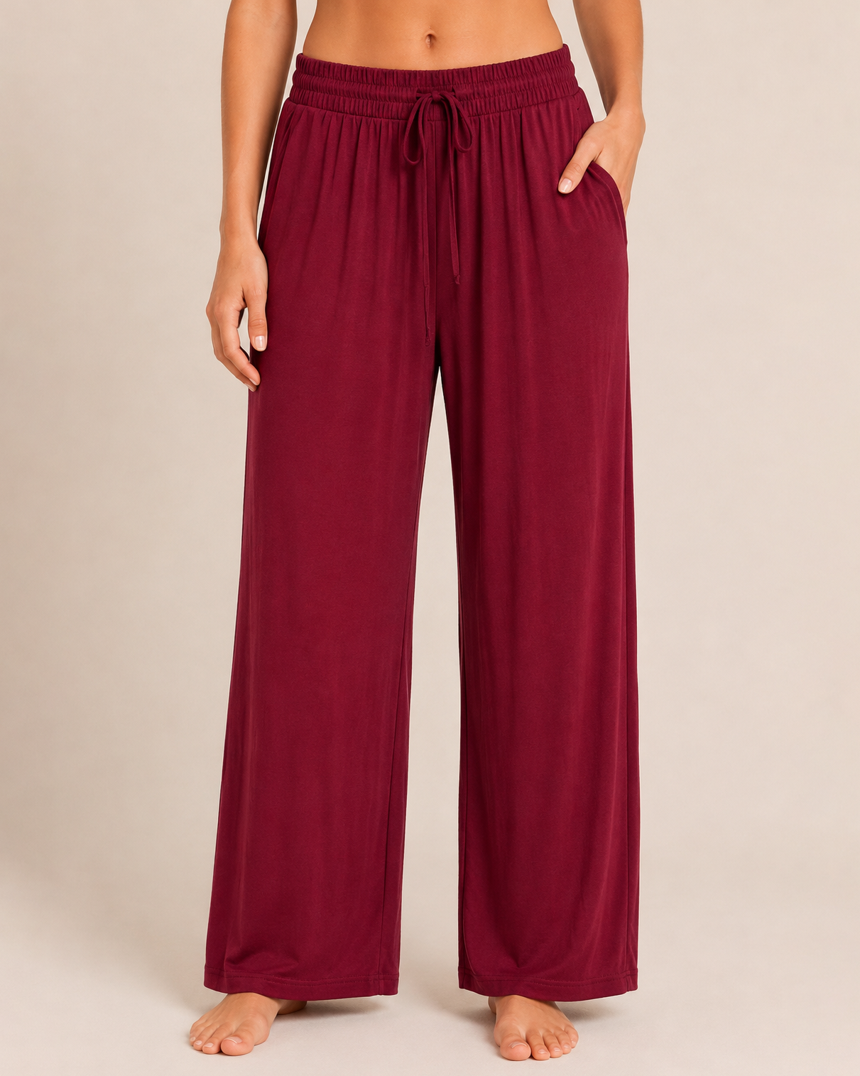 Front view of cabernet wide-leg pajama pants on a beige background