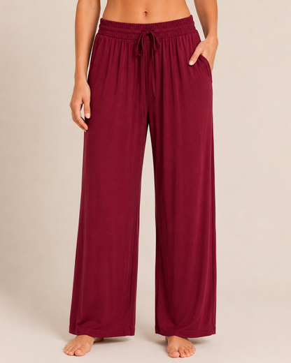 Front view of cabernet wide-leg pajama pants on a beige background