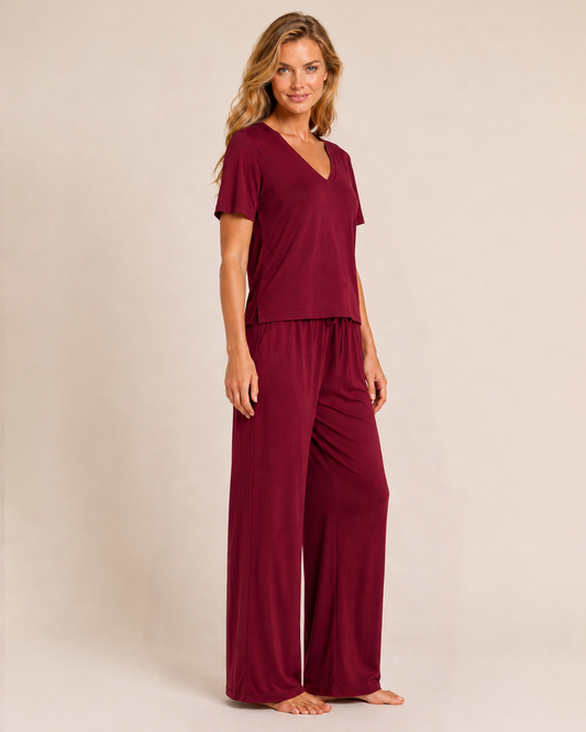 Front view of cabernet wide-leg pajama pants on a beige background