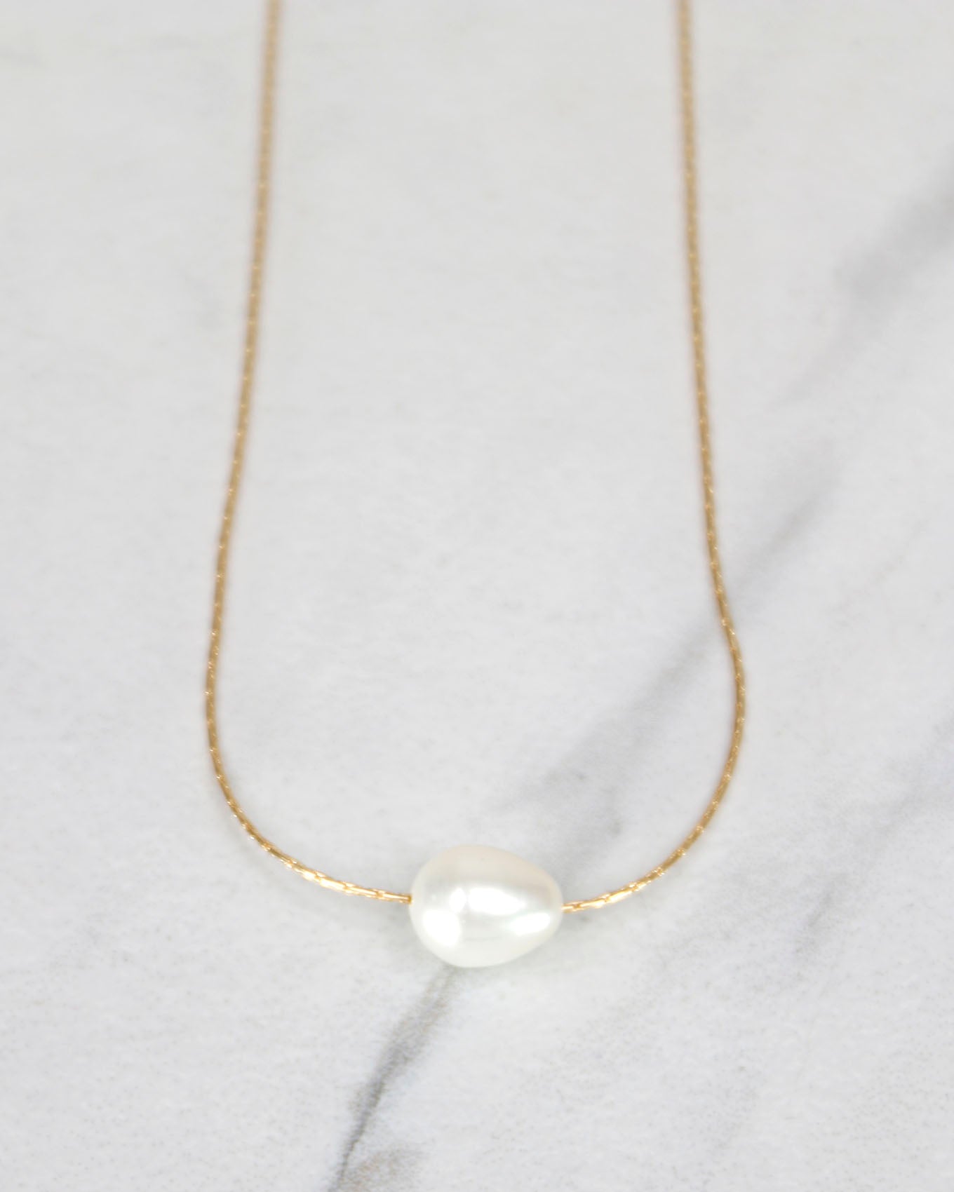 Close up view of Drop Pearl Necklace