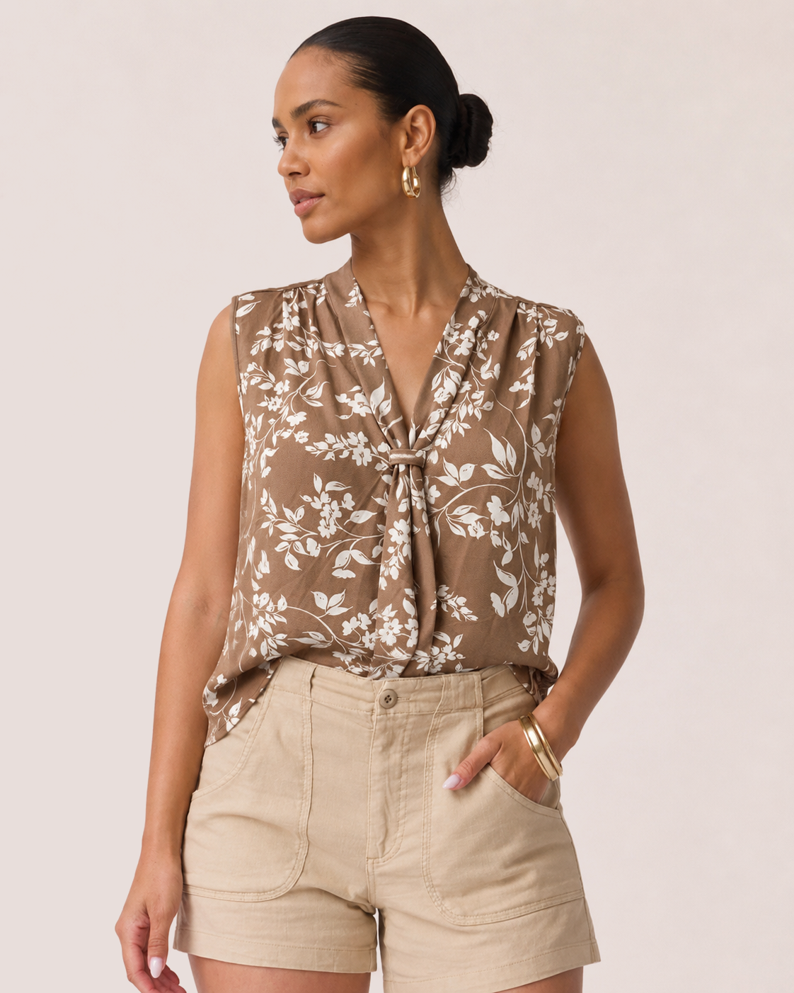 Easy Elegance Floral Sleeveless Top front tucked on model in khaki linen shorts