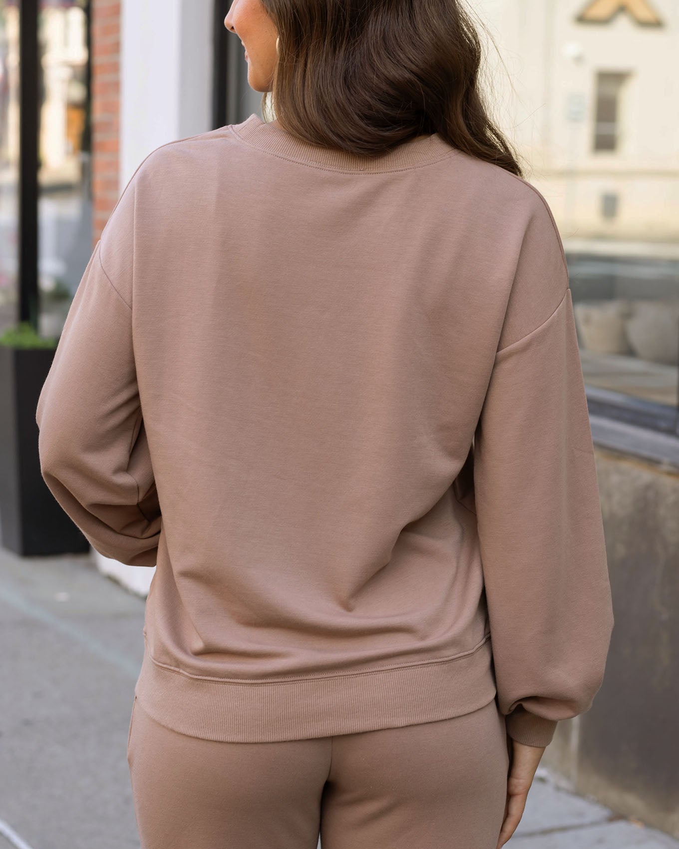 back view of soft tan sweatshirt