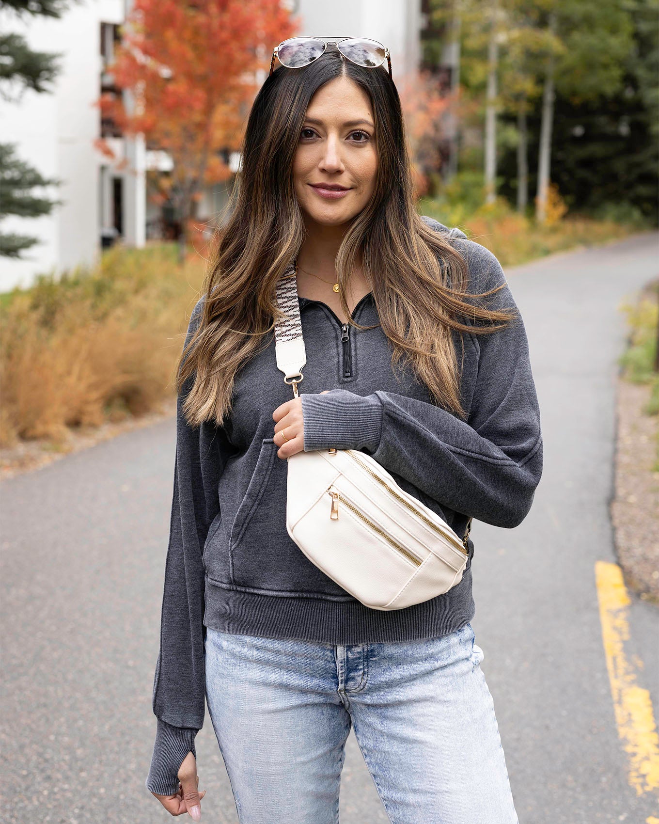front styled view of ivory belt bag