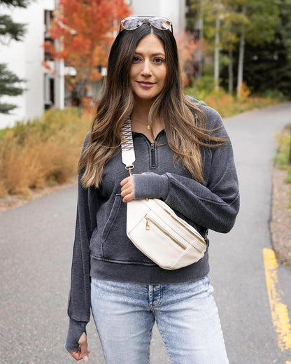front styled view of ivory belt bag