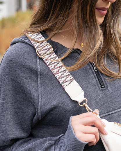 strap view of ivory belt bag