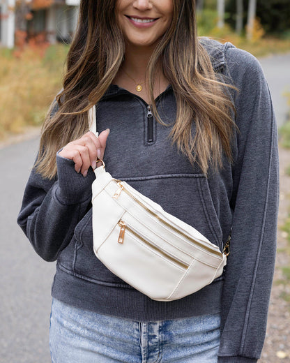 front view of Ivory Faux Leather Belt Bag with Guitar Strap