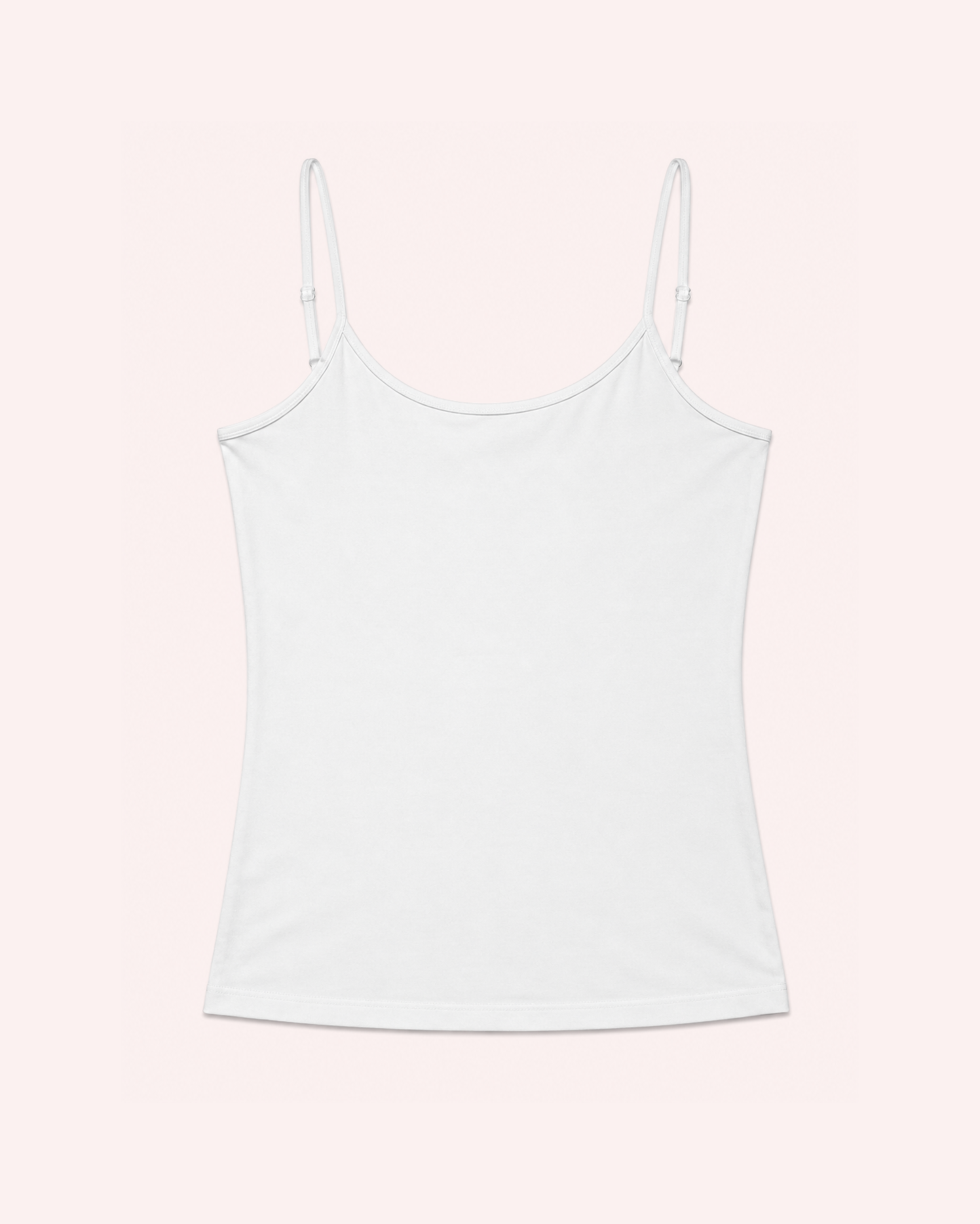 White spaghetti strap tank top on a beige background