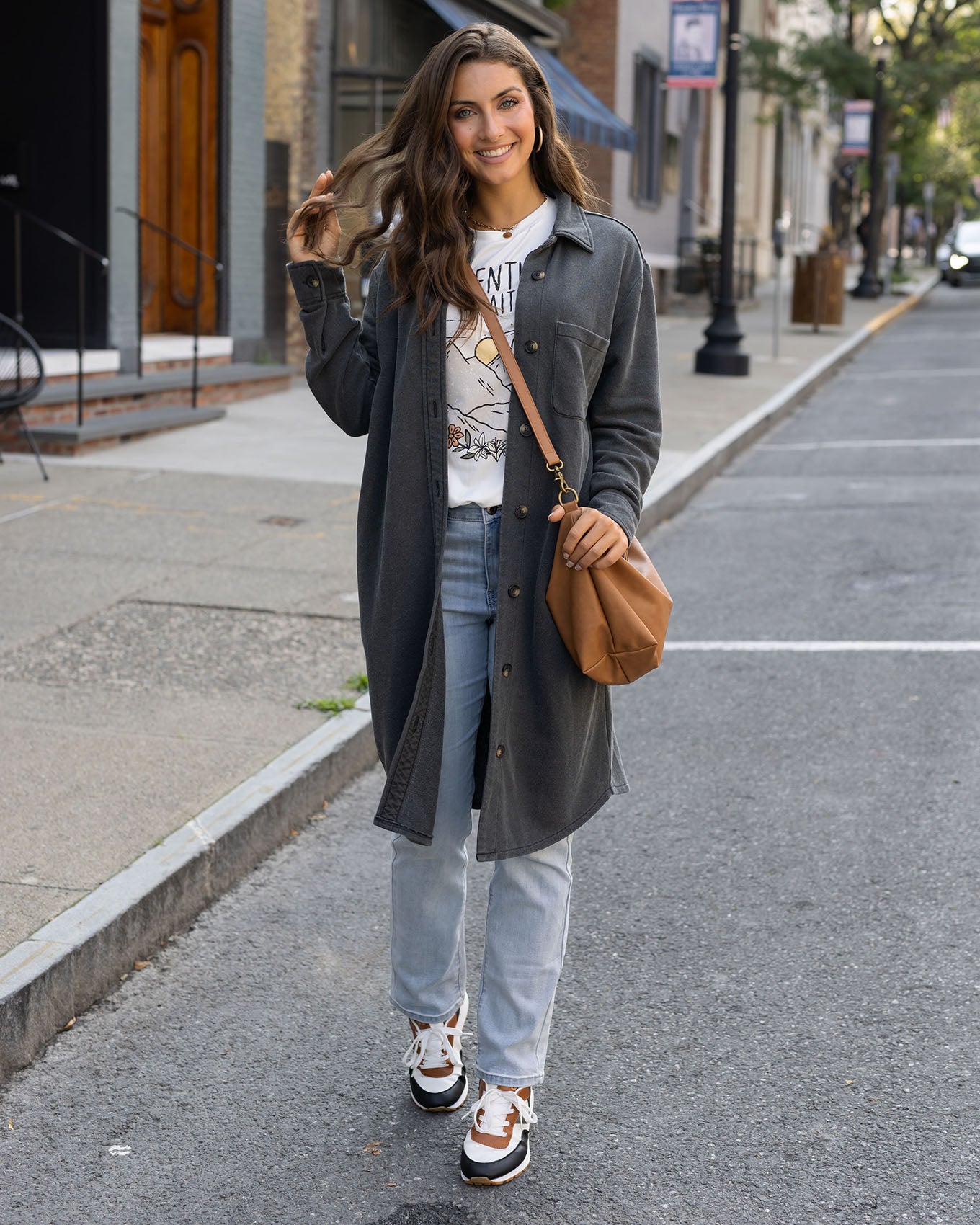 full body view of dark grey duster jacket