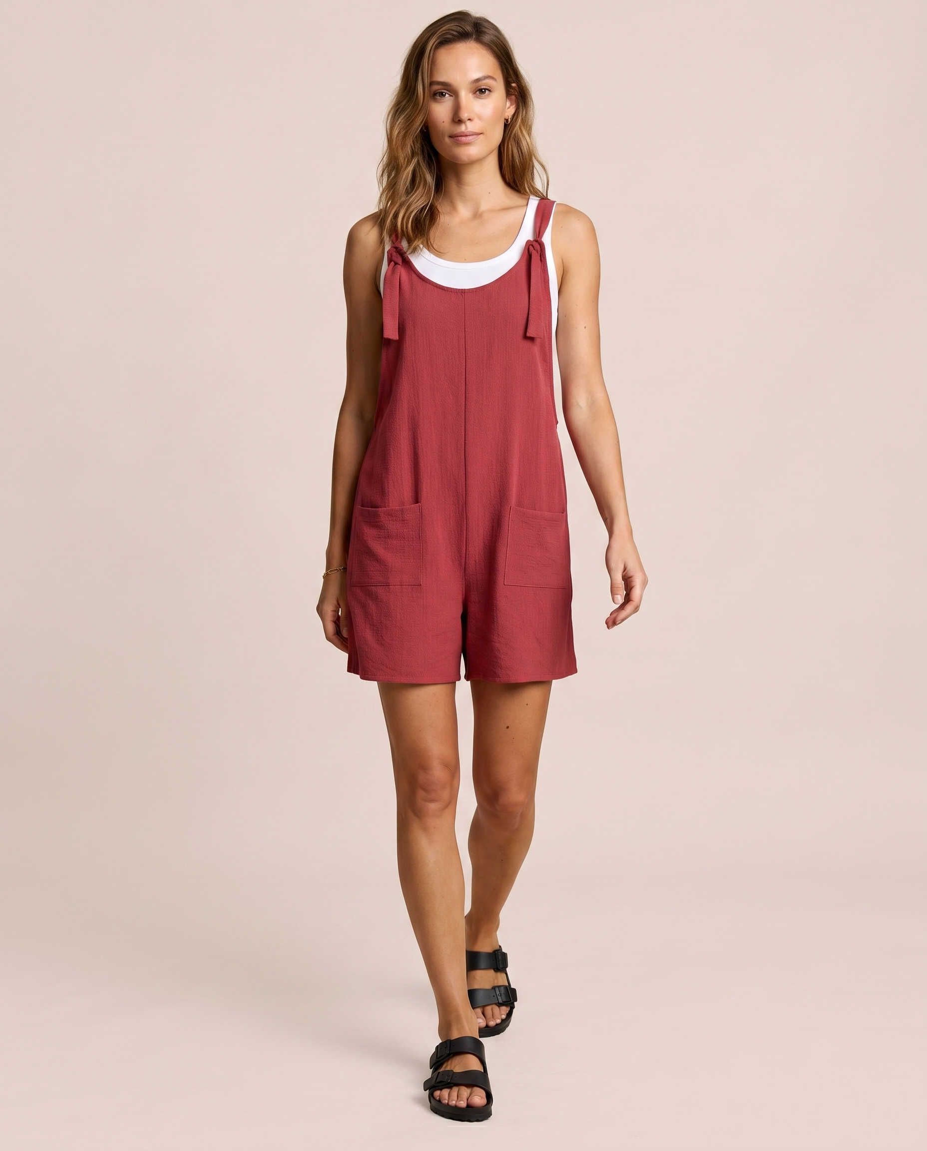 Woman wearing the Easy Breezy Hibiscus Romper