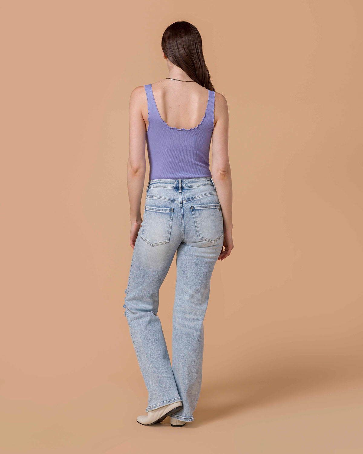 Wide Leg Premium Denim in Distressed Light-Wash back view on model.