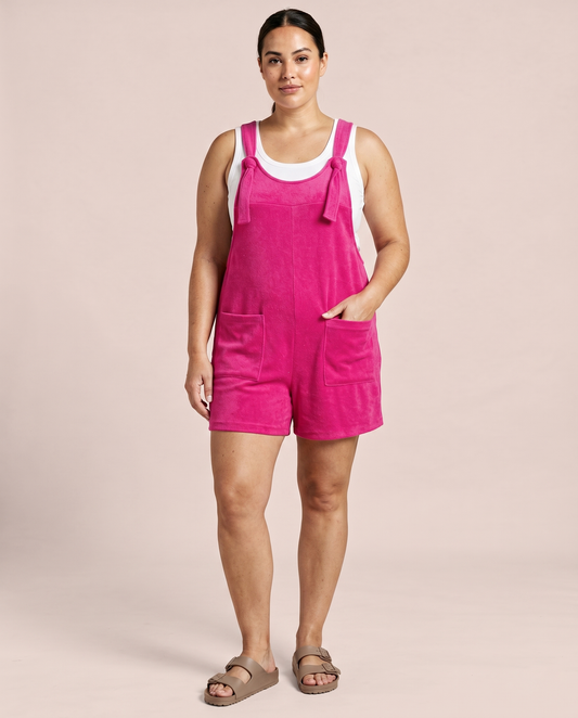 Woman wearing the Poolside Pink Terry Cloth Romper