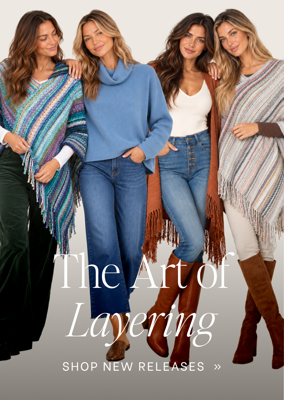 A promotional banner with the text 'The Art of Layering' and 'SHOP NEW RELEASES' on a light beige background. Four women are shown wearing layered clothing and shawls: a blue sweater with jeans  a rust-brown fringed shawl over a white top and jeans and a gray-and-white striped shawl over a white top and white pants  in the center