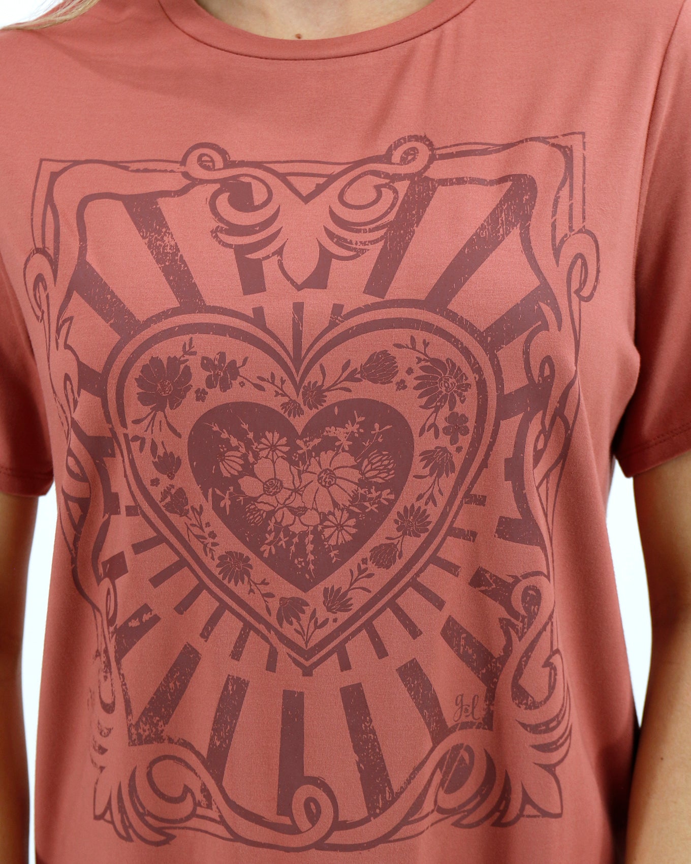 detail view of retro heart graphic tee