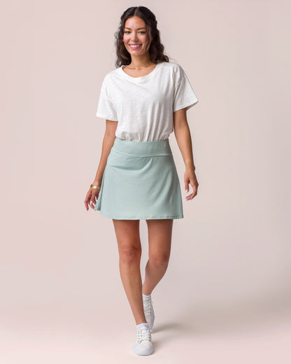 Everyday Active Skort in Sage Mist on Model with White cotton Sub Tee tucked