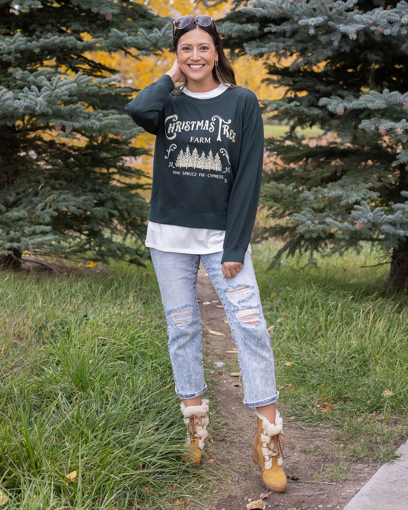 full body view of christmas tree farm graphic sweatshirt