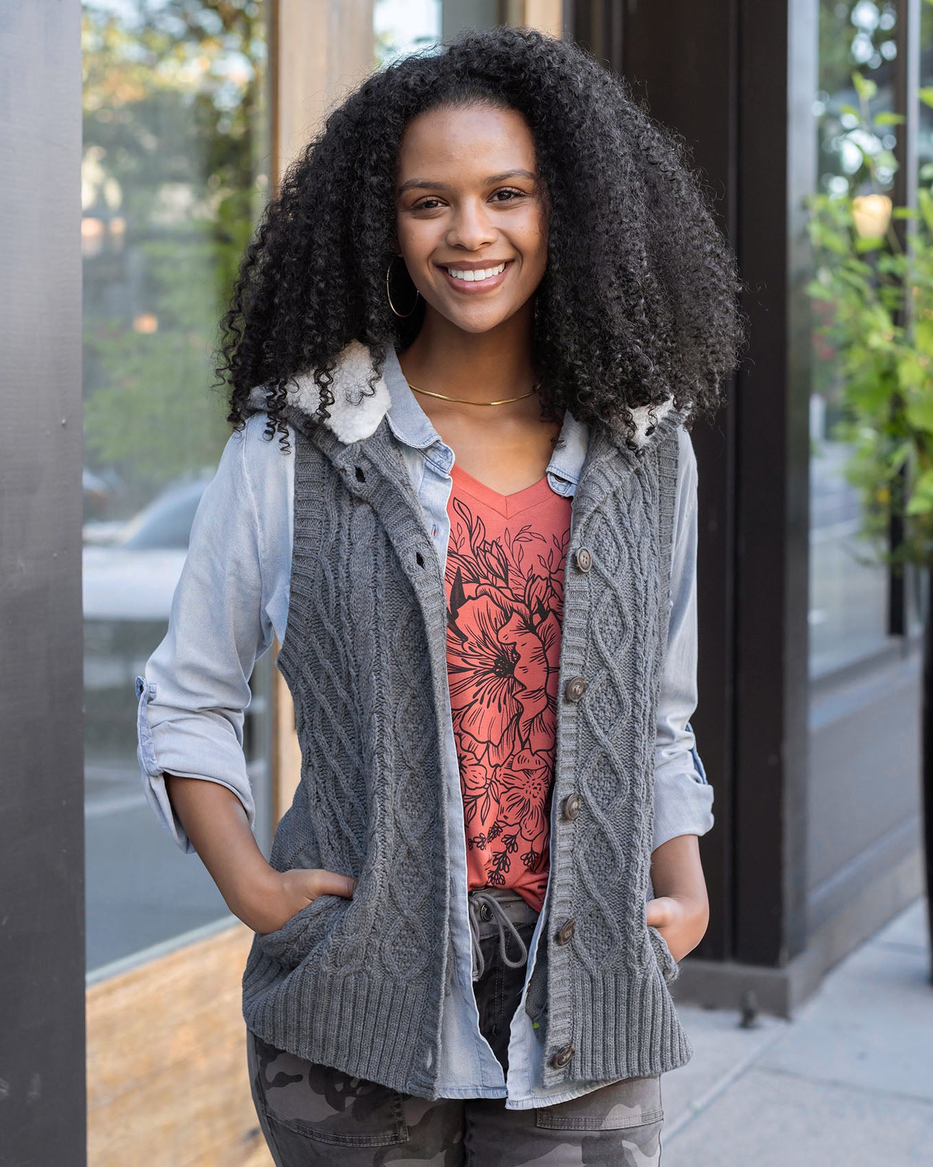 close up view charcoal hooded cable knit vest